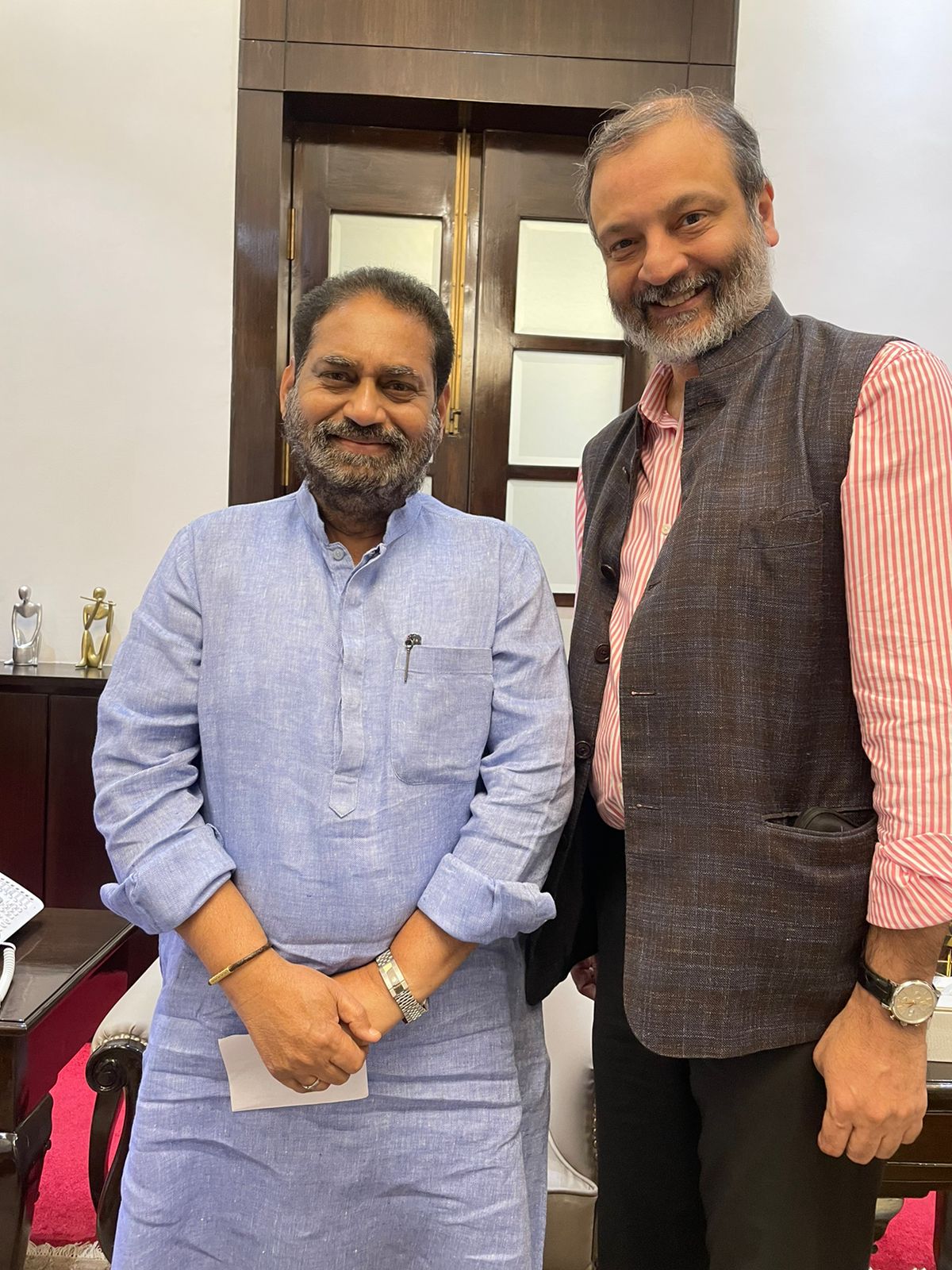 Nitin Raut Dr. Huzaifa Khorakiwala